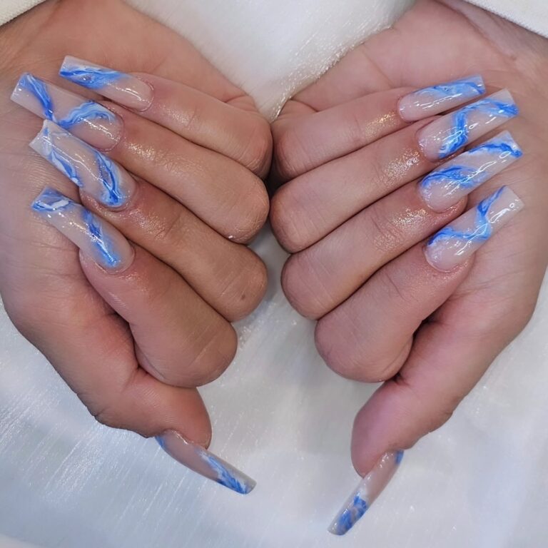 Blue marble swirl long acrylic nails at EM Nails & Beauty Bar Edmonton