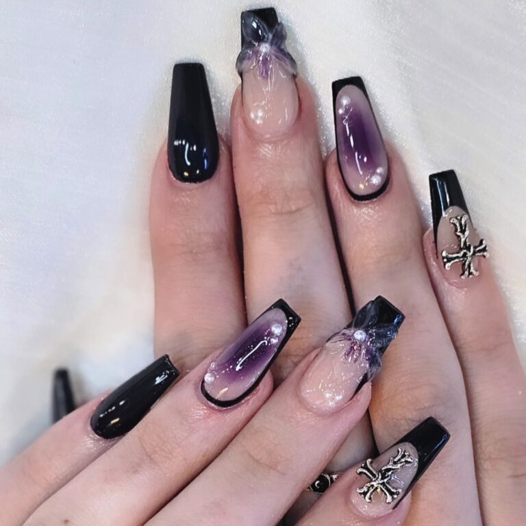 Purple and black cat-eye coffin acrylic nails in Edmonton